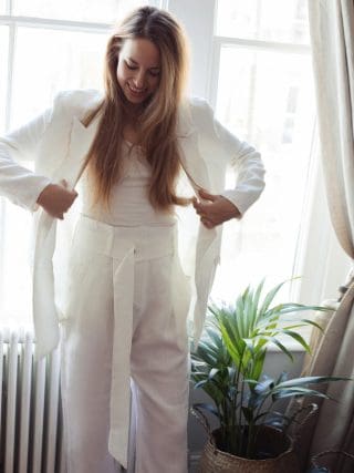 Isabella in White Oramai Suit