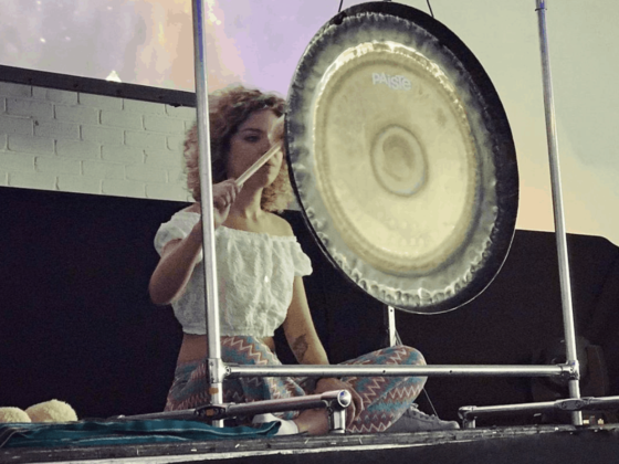 Zerya playing the gong