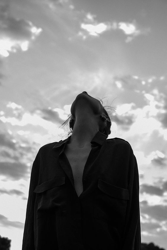 woman looking at the sky (black and white)