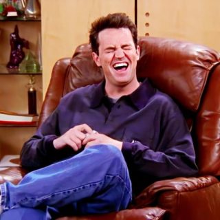 Chandler Bing from the TV series Friends laughing