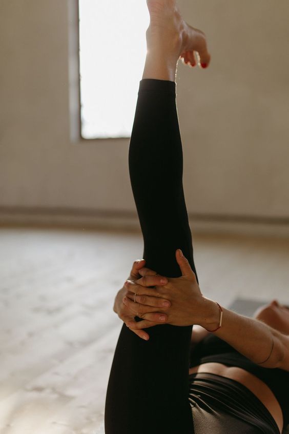 woman stretching legs