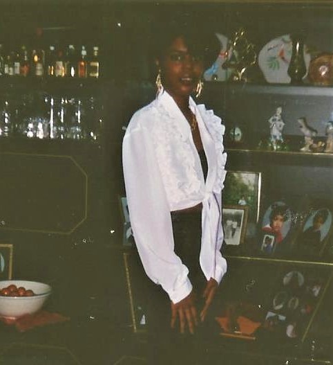 My Mother wearing a white silk blouse